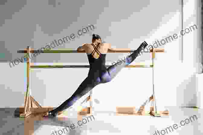 A Graceful Ballet Dancer Stretching Her Leg, Showcasing The Flexibility And Elegance Achieved Through Stretching Stretching: In Ballet Cheerleading Fitness