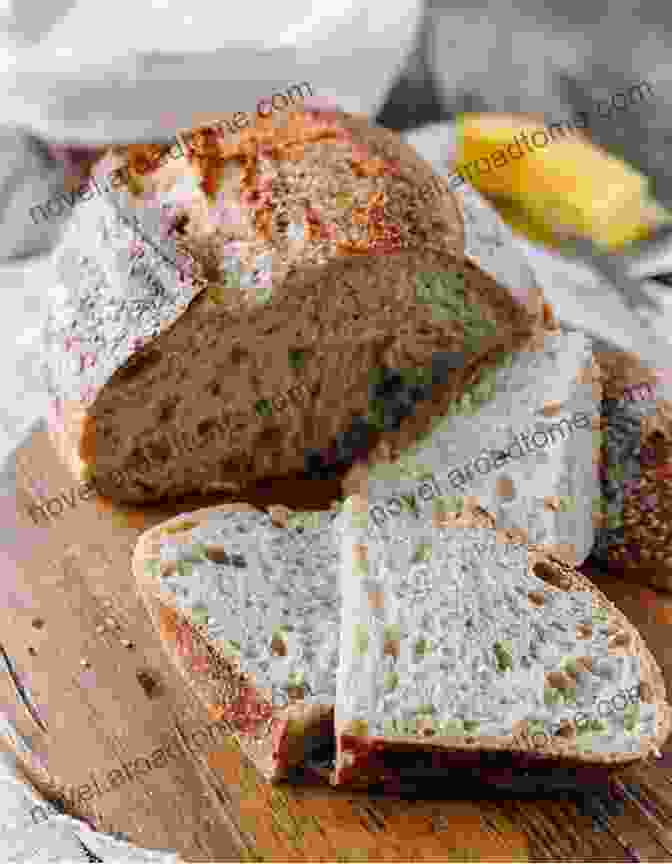 A Loaf Of Sourdough Bread On A Cutting Board MAKE TASTY SOURDOUGH : Bread But Yet Different