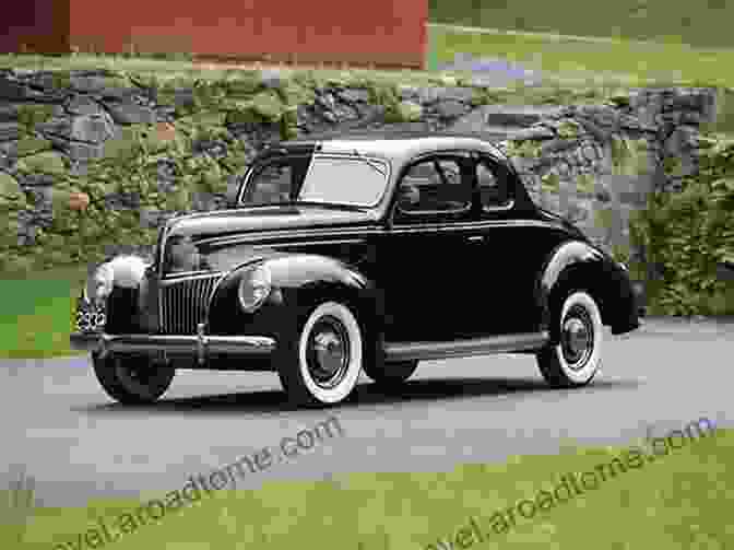 A Sleek Black 1939 Ford 2 Door Coupe Deluxe Parked On A Cobblestone Street 139 1939 Ford 2 Door Coupe Deluxe Robin Finlay