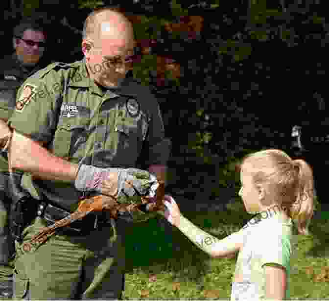 Fish And Game Warden Teaching Children About Wildlife Wildlife Wars: The Life And Times Of A Fish And Game Warden