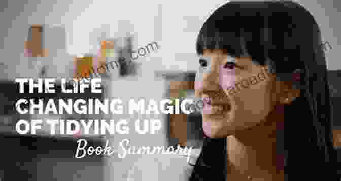 Marie Kondo, Author Of 'The Life Changing Magic Of Tidying Up', Smiling And Holding A Pile Of Folded Clothes Summary: Marie Kondo S The Life Changing Magic Of Tidying Up: The Japanese Art Of Decluttering And Organizing