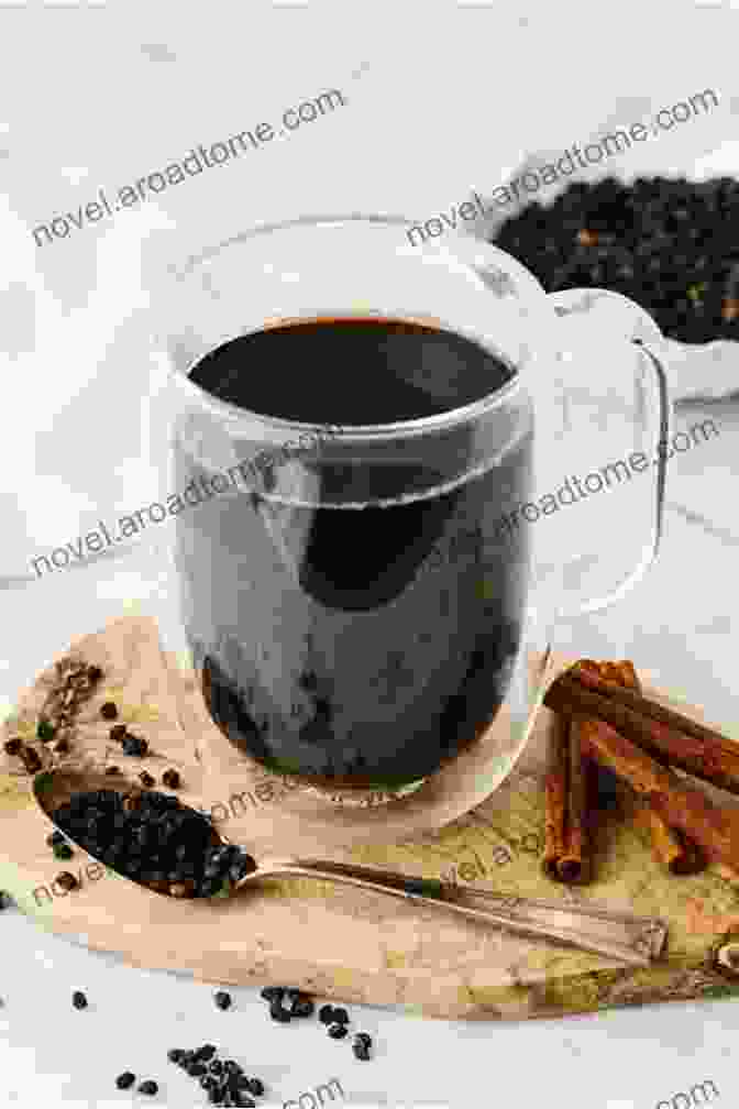 Person Enjoying A Cup Of Elderberry Tea Dr Sebi Cure For All Diseases: The Definitive Guide On How To Treat Naturally The Most Common Diseases And Detox The Liver In 9 Steps Bonus: Proven Methods To Stop Smoking